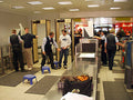 Handheld metal detector wand being used for security scanning