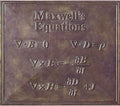 James Clerk Maxwell statue with his famous electromagnetic equations inscribed in stone