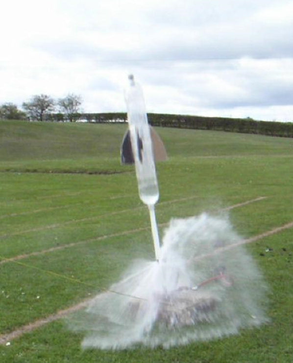 Water rocket launching from a bottle using compressed air propulsion