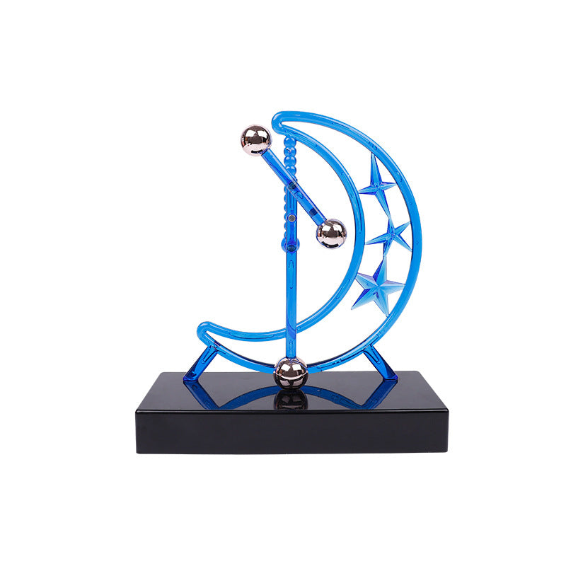 Moon crescent Newton’s Cradle showing steel spheres in motion