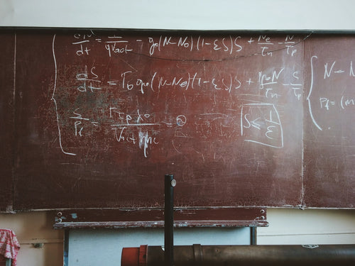 Physics equations on a university chalkboard — Daniel Toupin consultation