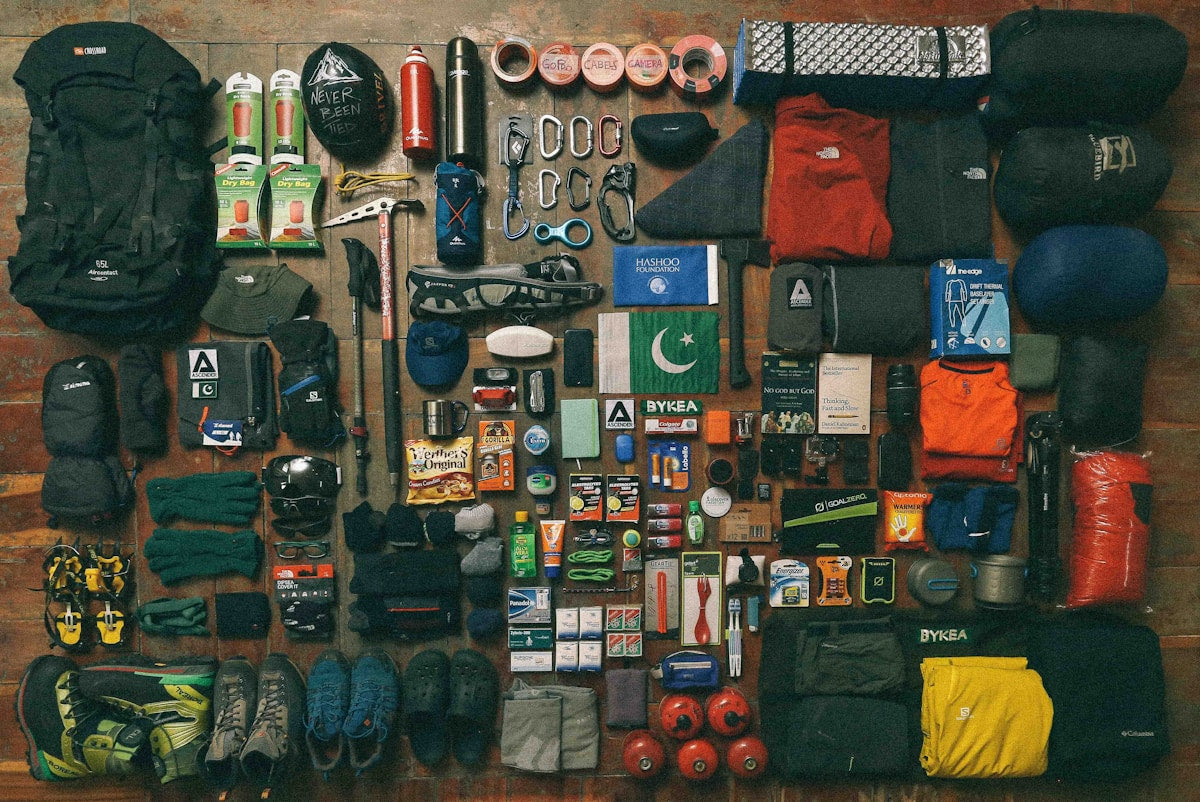 Emergency preparedness and outdoor survival gear laid out