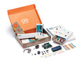 Arduino Starter Kit unboxed with UNO board, breadboard, sensors, and project book